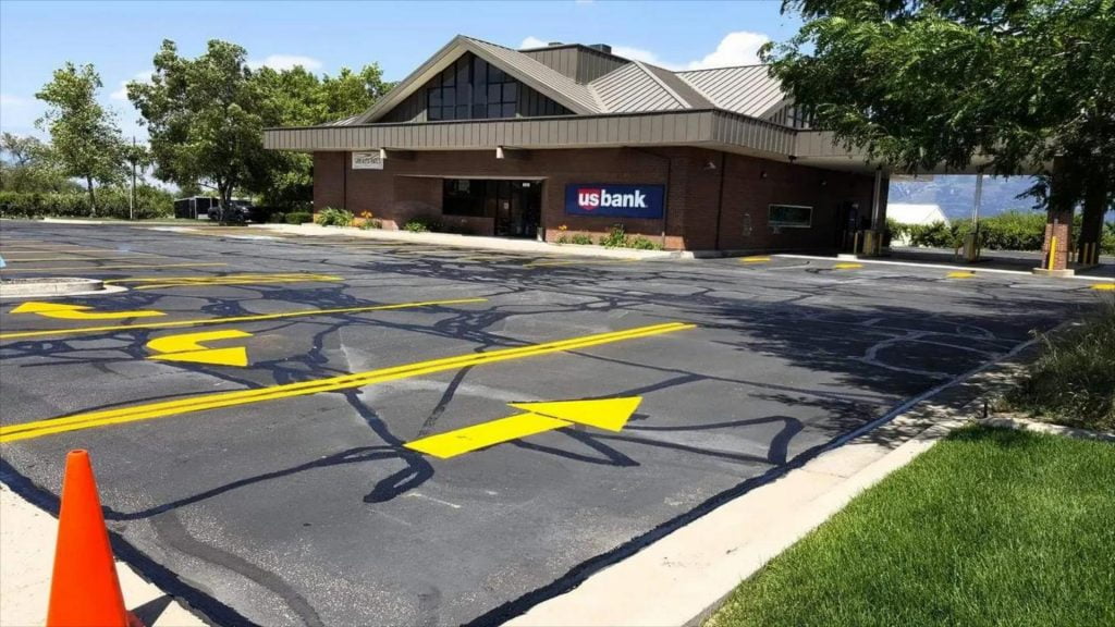 stripped parking lot with yellow lines